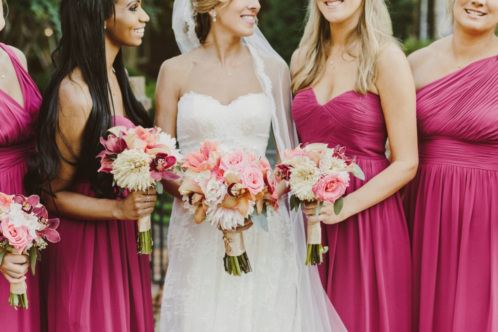 coral florals pink bridesmaid gowns