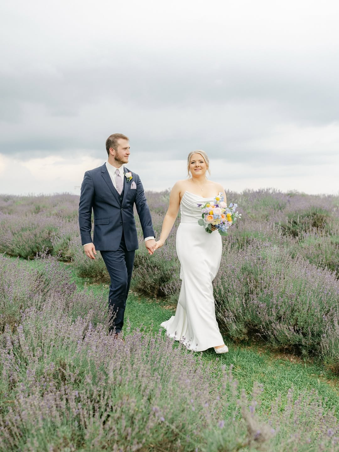 What a day for Lauren and Edward!🪻Big, fat thunder clouds rolled in right as the ceremony ended (1) Springfield Manor Lavender Field_Top 5 Rustic Farm Wedding Venues in Maryland