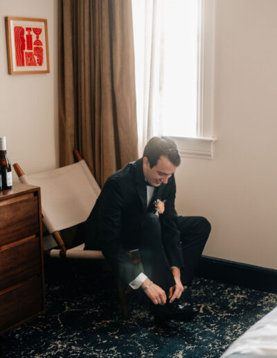 Groom Getting Ready Summer wedding at George Peabody Library